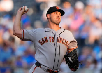 San Francisco Giants starting pitcher Tyler Mahle throws during the first inning of a baseball game against the Kansas City Royals AP Photo/Charlie Riedel