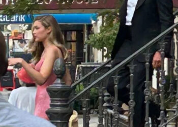 Gigi Hadid and Bradley Cooper head to Taylor Swift and Travis Kelce's wedding in N.Y.C.Credit: TMZ/BACKGRID