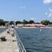 Pier with beach and striped tent
