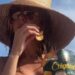 Heidi Klum Goes Topless in Nothing but Bikini Bottoms While Eating Chips