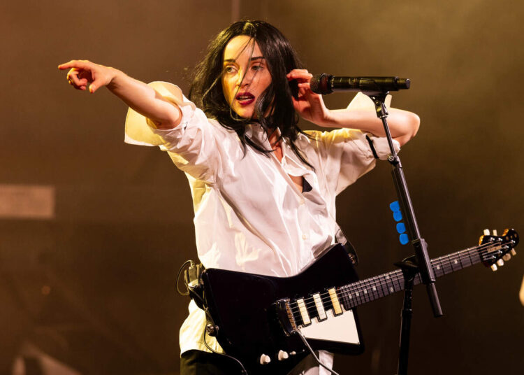 St. Vincent performs at Hopscotch Music Festival in 2024. The event is returning to downtown Raleigh this year.