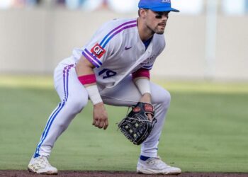 Wearing the Kansas City Royals' new "Forever Fountains" City Connect uniform, second baseman Michael Massey (19) watches a play in the first inning against the Houston Astros on Friday, June 12, 2026, at Kauffman Stadium in Kansas City.