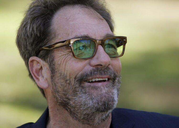 Huey Lewis 'can't enjoy music' anymore since he's 'basically deaf'