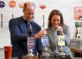 Britain's Prince William, Prince of Wales and Britain's Catherine, Princess of Wales, pull pints during a visit to the Southwark Brewing Company at the Bermondsey Beer Mile in London on March 12, 2026. (Photo by Kin Cheung / POOL / AFP)