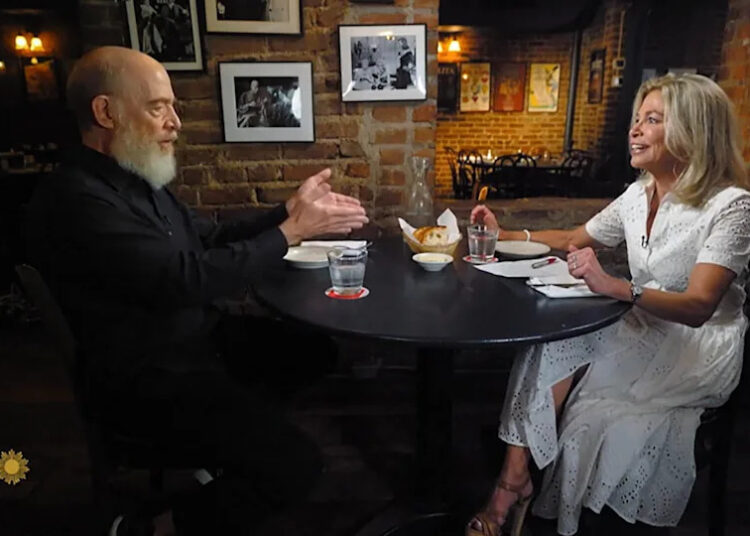 J.K. Simmons with correspondent Tracy Simmons, at a table Simmons did not set himself, at Joe Allen.  / Credit: CBS News