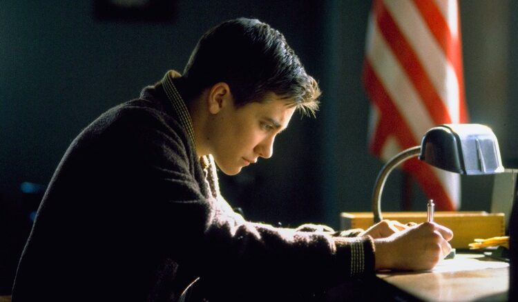 Jake Gyllenhaal studying at his desk in October Sky