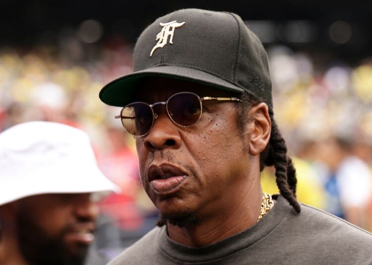 Jay-Z looks on ahead of the start the World Cup round of 16 soccer match between Brazil and Norway in East Rutherford, N.J., near New York, Sunday, July 5, 2026.