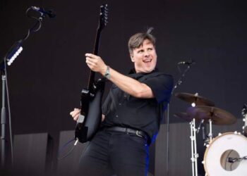 Jim Adkins of Jimmy Eat World performs during day one...