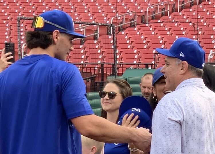 Kansas City Royals outfielder Jac Caglianone greets his father, Jeff, ahead of making his major-league debut on June 3, 2025, at Busch Stadium in St. Louis.