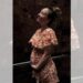 Kaley Cuoco posed in a floral dress while cradling her baby bump in one of the snapshots.@KALEYCUOCO/INSTAGRAM