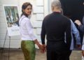 Katie Holmes was photographed holding hands with a man at the premiere of The Invite