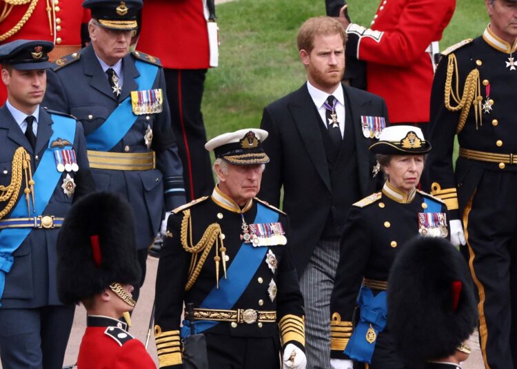 FILE - Britain's King Charles III, Princess Anne, Prince William and Prince Harry follow Queen Elizabeth II's coffin at Windsor Castle, Windsor, England in 2022.
