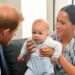 The Duke and Duchess of Sussex holding their son Archie during a meeting with Archbishop Desmond Tutu in South Africa in 2022 (Toby Melville/PA)
