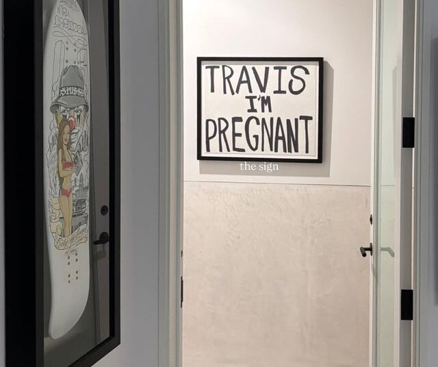 Kourtney Kardashian's 'Travis I'm Pregnant' sign on a wall at her homeCredit: Kourtney Kardashian/Instagram