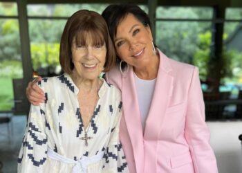 Kris Jenner and her mother, Mary Jo Campbell, embracing and smiling.