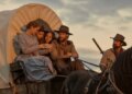 (L to R) Crosby Fitzgerald as Caroline Ingalls, Alice Halsey as Laura Ingalls, Skywalker Hughes as Mary Ingalls, Luke Bracey as Charles Ingalls, Warren Christie as John Edwards in "Little House on the Prairie."
