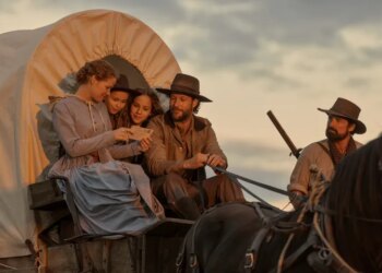 (L to R) Crosby Fitzgerald as Caroline Ingalls, Alice Halsey as Laura Ingalls, Skywalker Hughes as Mary Ingalls, Luke Bracey as Charles Ingalls, Warren Christie as John Edwards in "Little House on the Prairie."