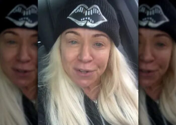 Theresa Caputo wearing a beanie in her car.