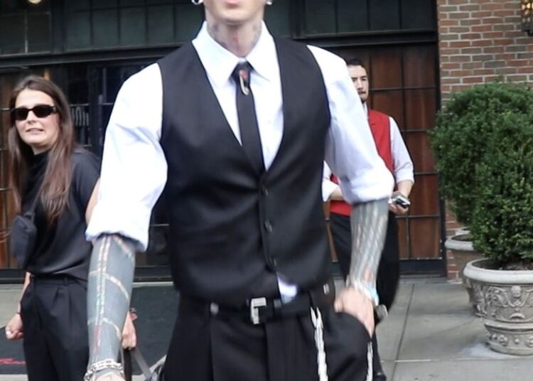Machine Gun Kelly heading to Travis Kelce and Taylor Swift's weddingCredit: BACKGRID