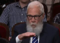 David Letterman sitting in an audience chair during his final Late Show appearance in 2026. .