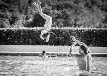 Prince Harry tosses Princess Lilibet into the air as Prince Archie swims behind them in Meghan Markle’s new family holiday photos, posted on July 23, 2026Credit: Meghan Markle/Instagram