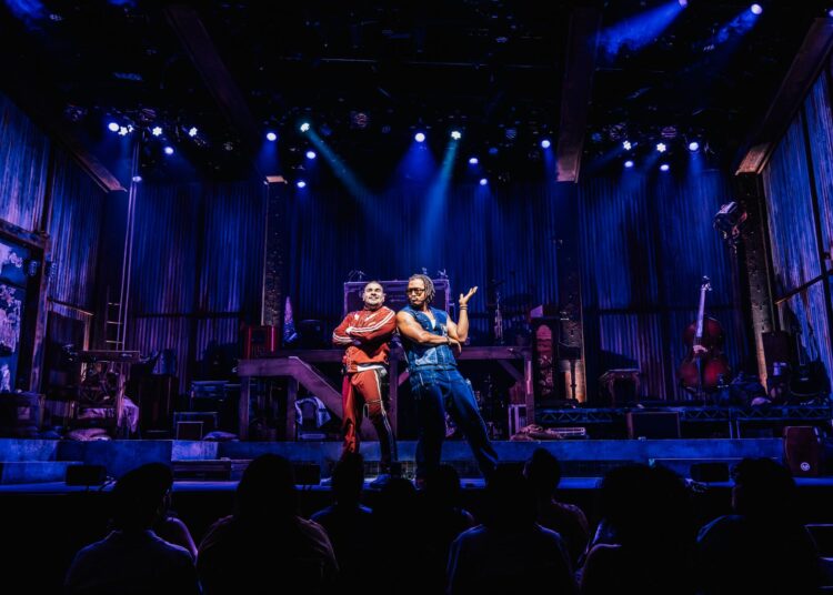 Brian Quijada, left, and Nygel D. Robinson in "Mexodus" at the Pasadena Playhouse.