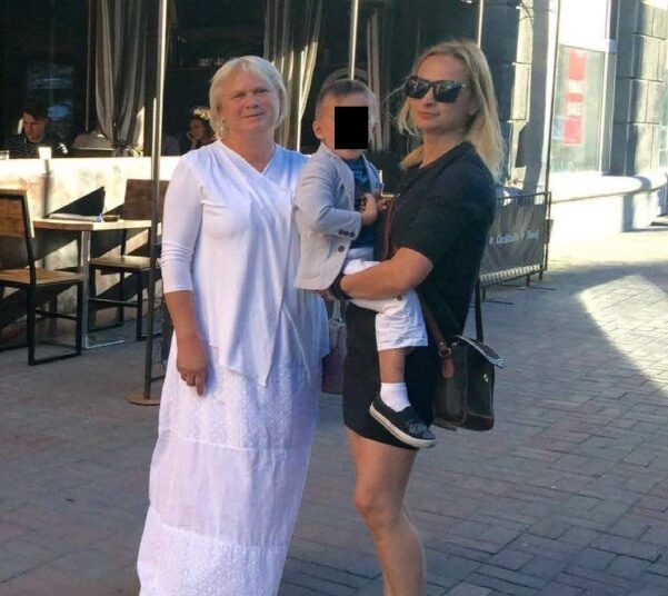 Olga Solovey (left) visits with her daughter, Halyna Hutchins, and Hutchins' son. (Coutesy of Gloria Allred's office)