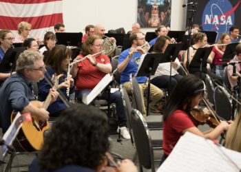 Musicians perform at NASA Langley's "Stars, Stripes, and Supernovas – Symphony Under the Stars" event.