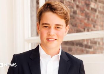 A pic of Prince George in a suit