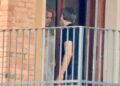 Nicole Kidman shares a farewell with a mystery man outside the suite of her Italian hotel.