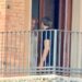 Nicole Kidman shares a farewell with a mystery man outside the suite of her Italian hotel.