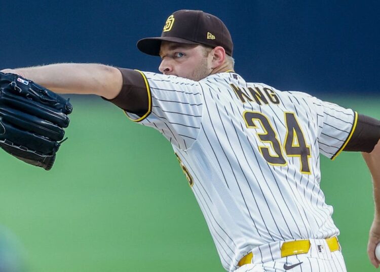 Michael King throws a pitch at Petco Park.