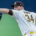Michael King throws a pitch at Petco Park.