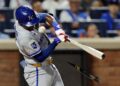 Kansas City Royals' Tyler Tolbert breaks his bat on a foul ball during the fifth inning of a baseball game against the New York Mets, Tuesday, July 7, 2026, in New York. (AP Photo/Adam Hunger)