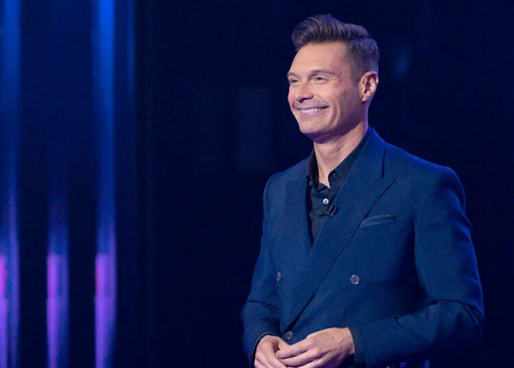 Ryan Seacrest on stage