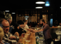 people at the bar in a pub