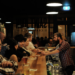 people at the bar in a pub