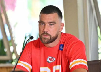 Kelce's childhood friend is the adopted son of an ICE contractor.MEGA