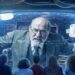 Sigmund Freud peers out of a screen at the