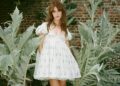 Daisy Edgar-Jones styled a little white babydoll dress from McQueen with the lace-up heels trend