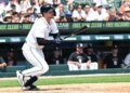 Tigers lose late lead, settle for series split with Royals
