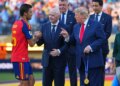 Spain’s Rodri is greeted by FIFA President Gianni Infantino and President Donald Trump during the World Cup final presentation ceremony.