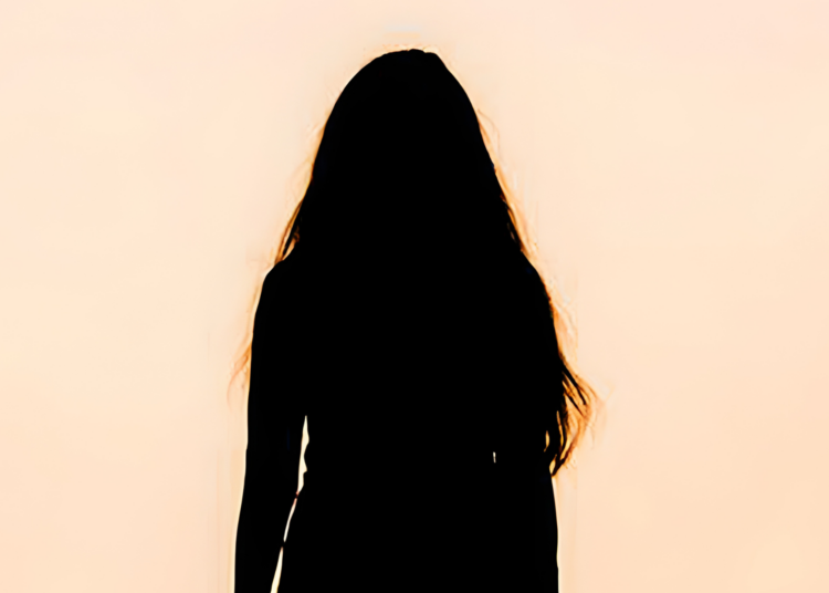Silhouette of a woman against an early morning sky contemplating her weekly horoscope for July 19-25, 2026