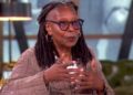 Whoopi Goldberg gesturing while speaking on a setCredit: ABC