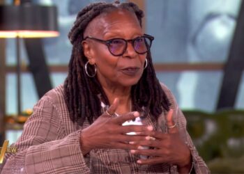 Whoopi Goldberg gesturing while speaking on a setCredit: ABC
