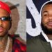 YG in a red cap and plaid shirt, wearing sunglasses and a chain. The Game in a hoodie and jacket, with a beard and tattoos.