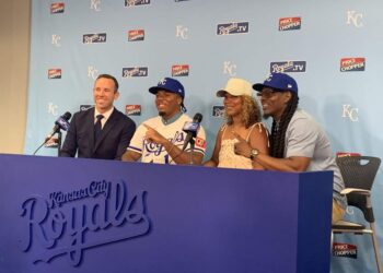 Royals first-round pick Zion Rose poses alongside his parents, Shaun and Karin Rose, and Royals area scout Nick Hamilton at Kauffman Stadium in Kansas City on Saturday, July 18, 2026.