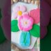 Pink cookie mason jar bouquet with 3 flowers and 2 leaves #cookiedecorating #royalicing