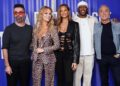 A cantora Got Talent da Grã -Bretanha Linda Mudzenda recebe a campainha dourada de Alesha Dixon