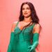 Dua Lipa Marks Marco 'enorme' marco com fotos sensuais da turnê